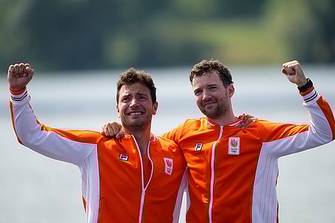 Netherland's Melvin Twellaar and Stef Broenink celebrate silver